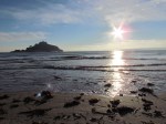 Sun setting on St Michael's Mount